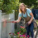 Homeowner performing how to improve curb appeal without overspending task
