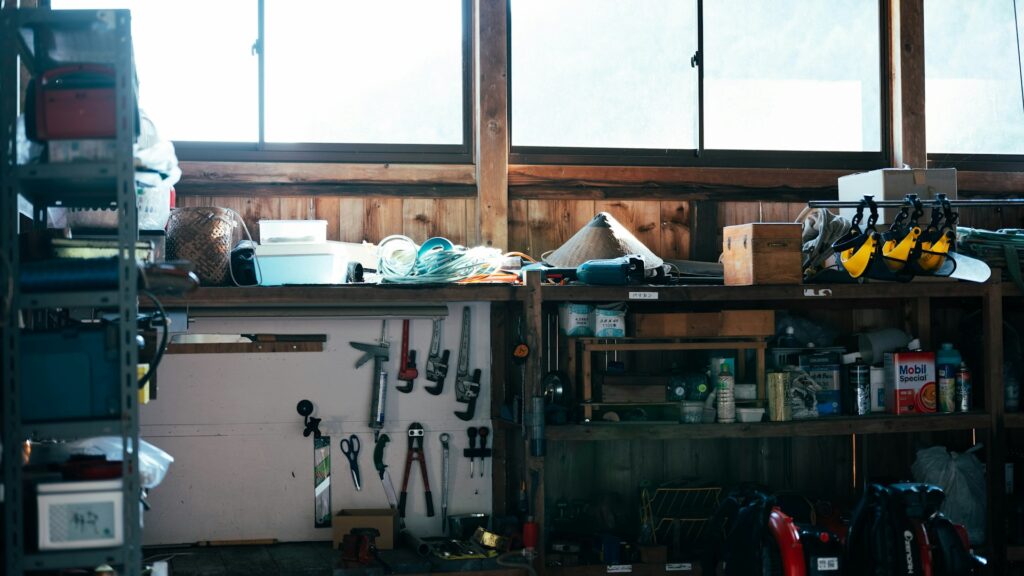 Homeowner performing how to organize and maximize garage storage space task